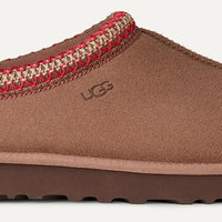 Brown slipper with red and beige patterned interior on a white background