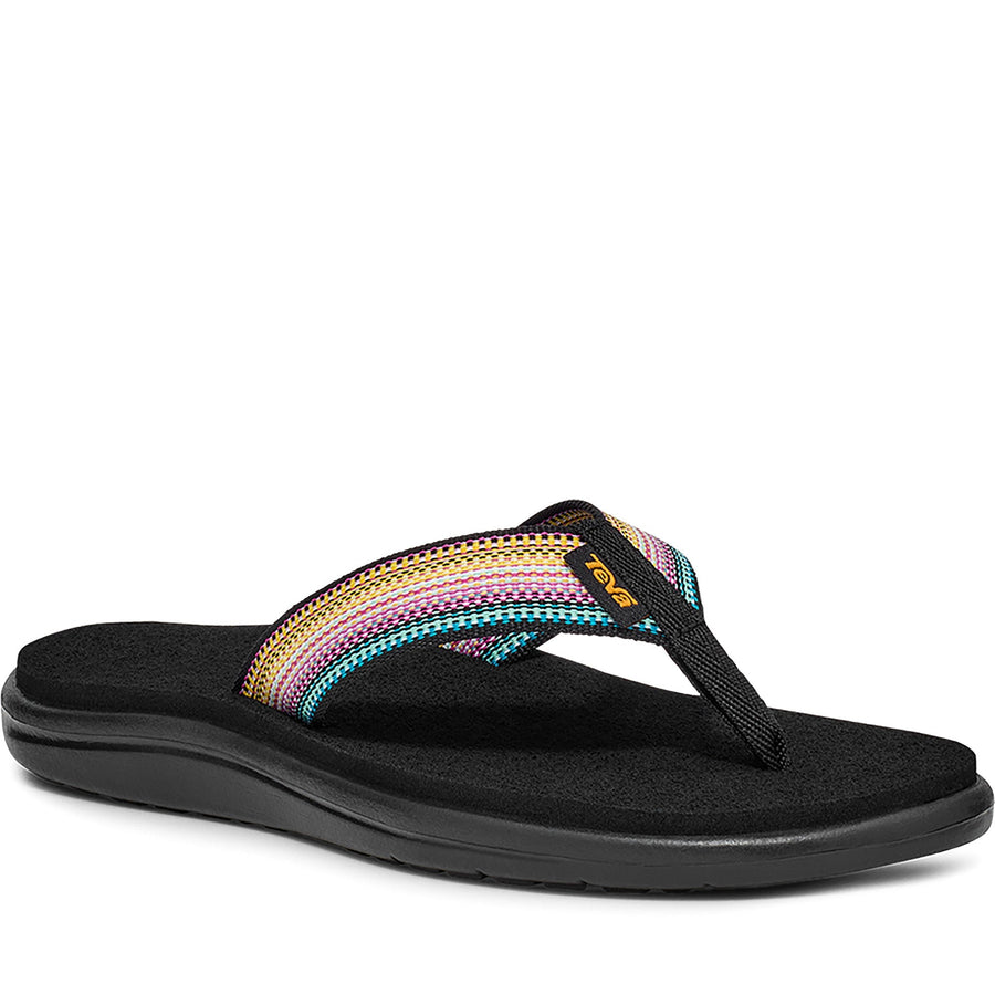 Quarter turn Women's TEVA Footwear style name Voya Flip in color Antiguous Black Multi. Sku: 1019040-ABML
