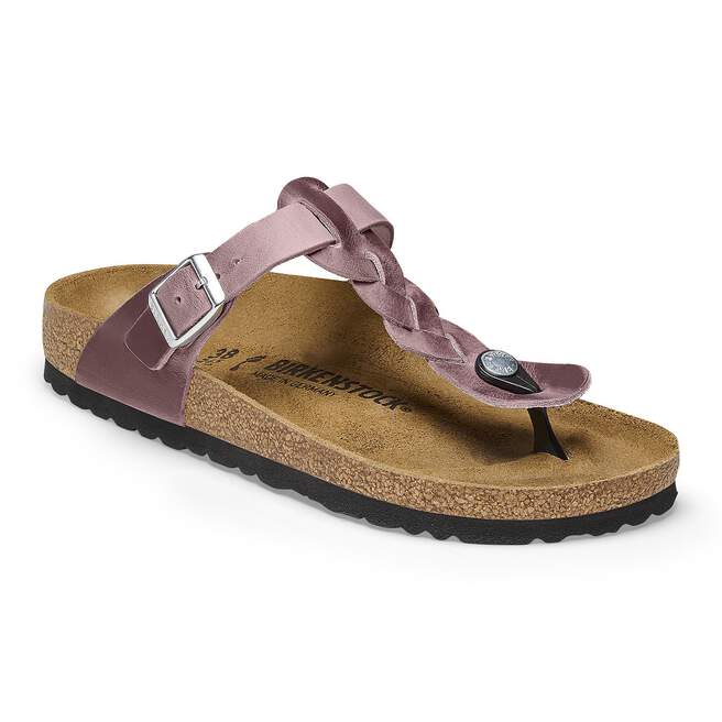 Birkenstock sandal with pink strap on a white background