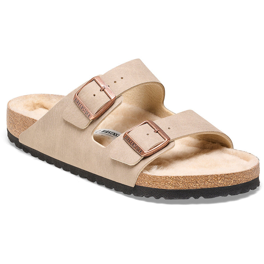 Quarter turn view Women's Birkenstock Footwear style name Arizona Birkibuc Shearling Narrow in color Desert Gray Taupe/ Sandcastle. Sku: 1025548