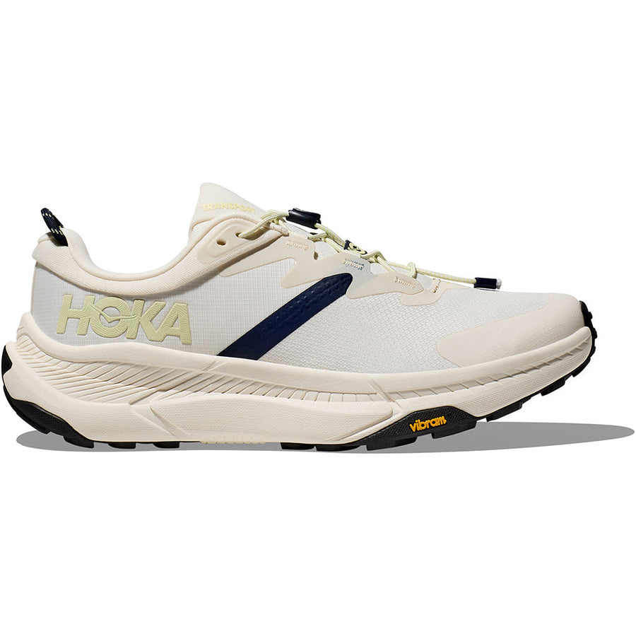 Quarter turn view Men's Hoka Footwear style name Transport in color Alabaster/ Varsity Navy. Sku: 1123153ARV