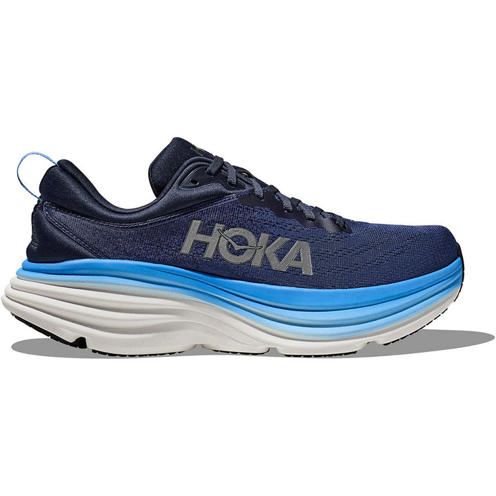 Quarter turn view Men's Hoka Footwear style name Bondi 8 Wide in color Outer Space/ All Aboard. Sku: 1127953OSAA