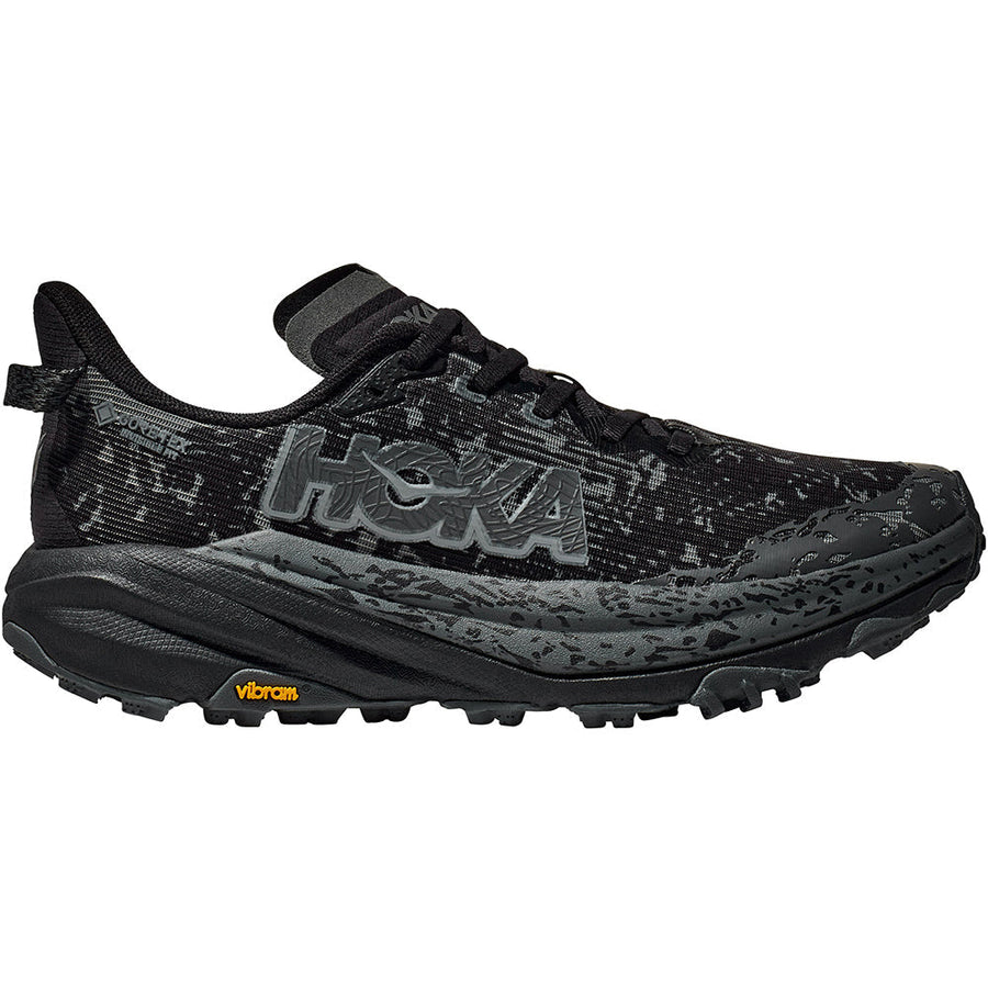 Quarter turn view Women's Hoka Footwear style name Speedgoat 6 GTX in color Black/ Outer Orbit. Sku: 1155151BCKT