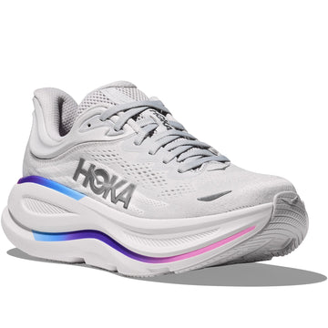 Quarter turn view Women's Hoka Footwear style name Bondi 9 in color Cosmic Grey/ White. Sku: 1162012-CYWH