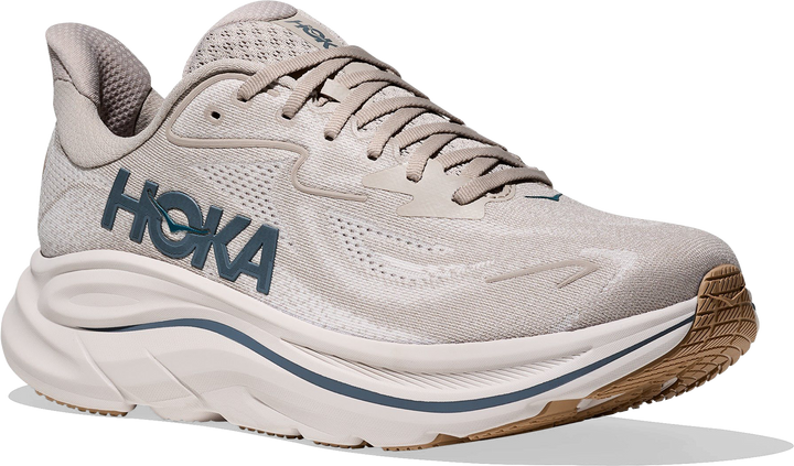 Quarter turn view Men's HOKA Footwear style name Clifton 10 in color Putty/ Grout. Sku: 1162030-PTYG