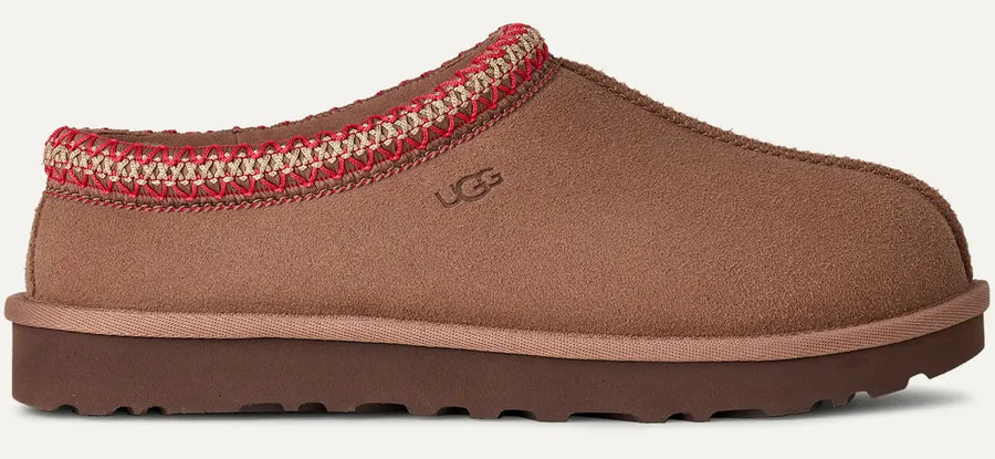 Brown slipper with red and beige patterned interior on a white background