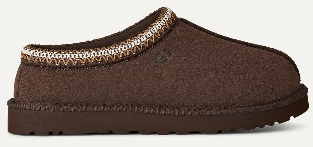 Brown slipper with a decorative trim on a white background