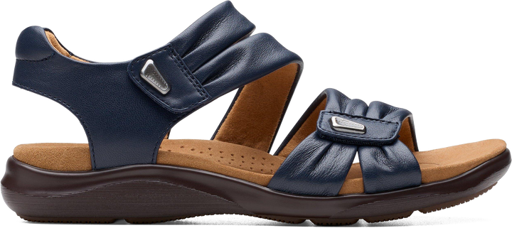 Quarter turn view Women's Clarks Footwear style name Kitly Ave Wide in color Navy. Sku: 26177305W