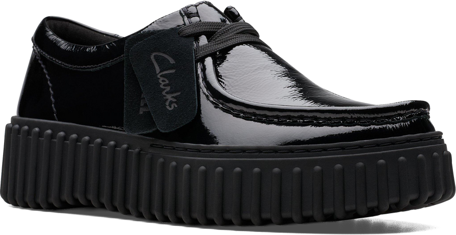 Quarter turn view Women's Clarks Footwear style name Torhill Bee in color BLACK PAT. Sku: 26179111