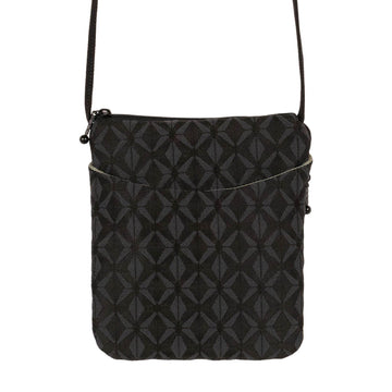 Quarter turn view Women's Maruca Hand Bag style name Cupcake Crossbody in color Diamond Black. Sku: 266-809