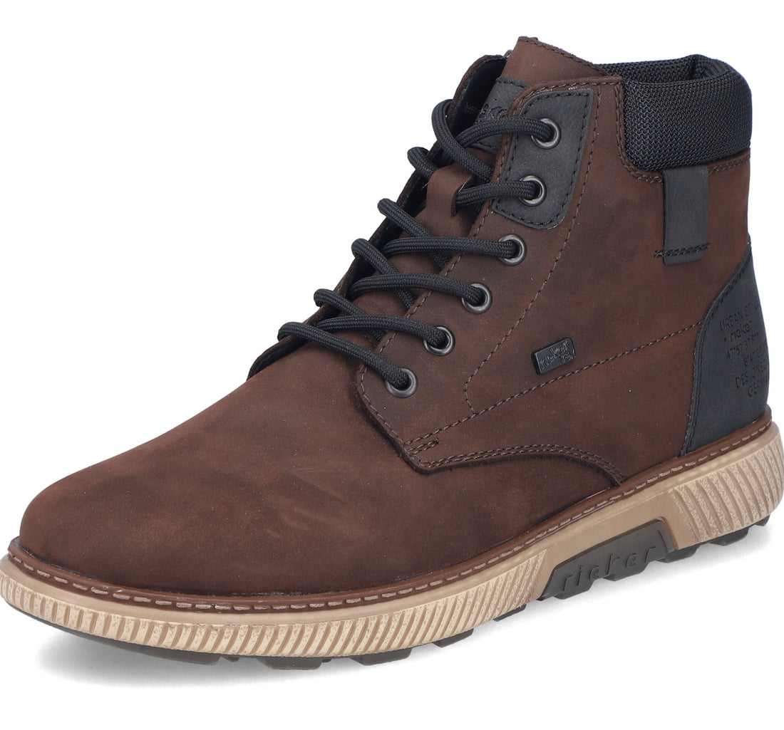 A brown suede lace-up ankle boot with dark gray accents, a beige ridged sole, and a black ankle collar, shown on a white background.