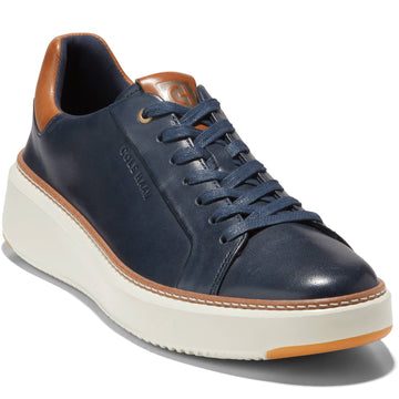 Quarter turn Men's Cole Haan Footwear style name Grandpro Topspin in color Navy Blazer. Sku: C37158