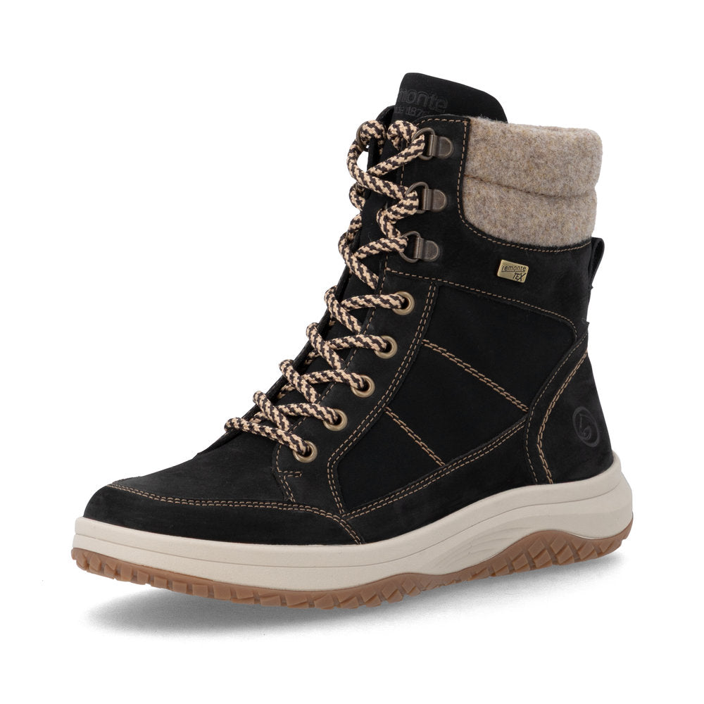 Black winter boot with brown laces and sole on a white background