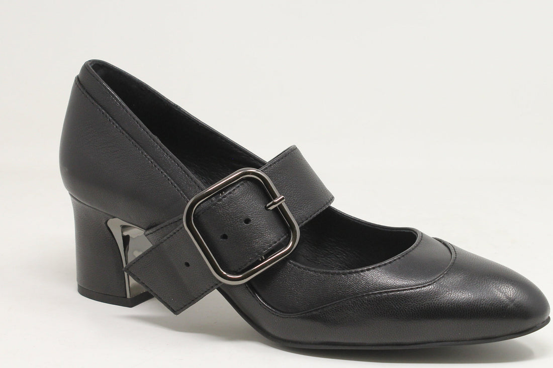 Black leather shoe with a buckle on a white background