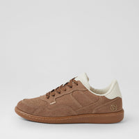 A single brown suede sneaker with a cream collar and a gum sole, shown in profile against a light gray background.