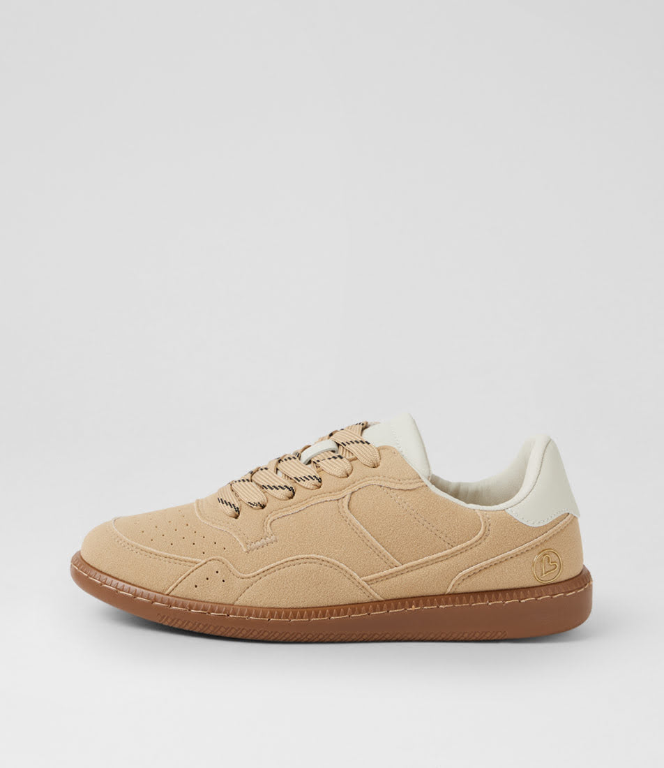 A low-top sneaker in beige suede and mesh with a brown gum sole, beige laces, and a cream collar, shown from a side profile on a light gray background.