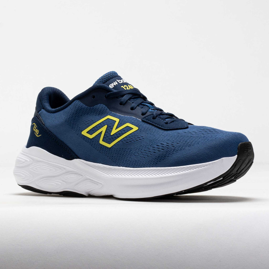 Blue running shoe with yellow logo on a white background