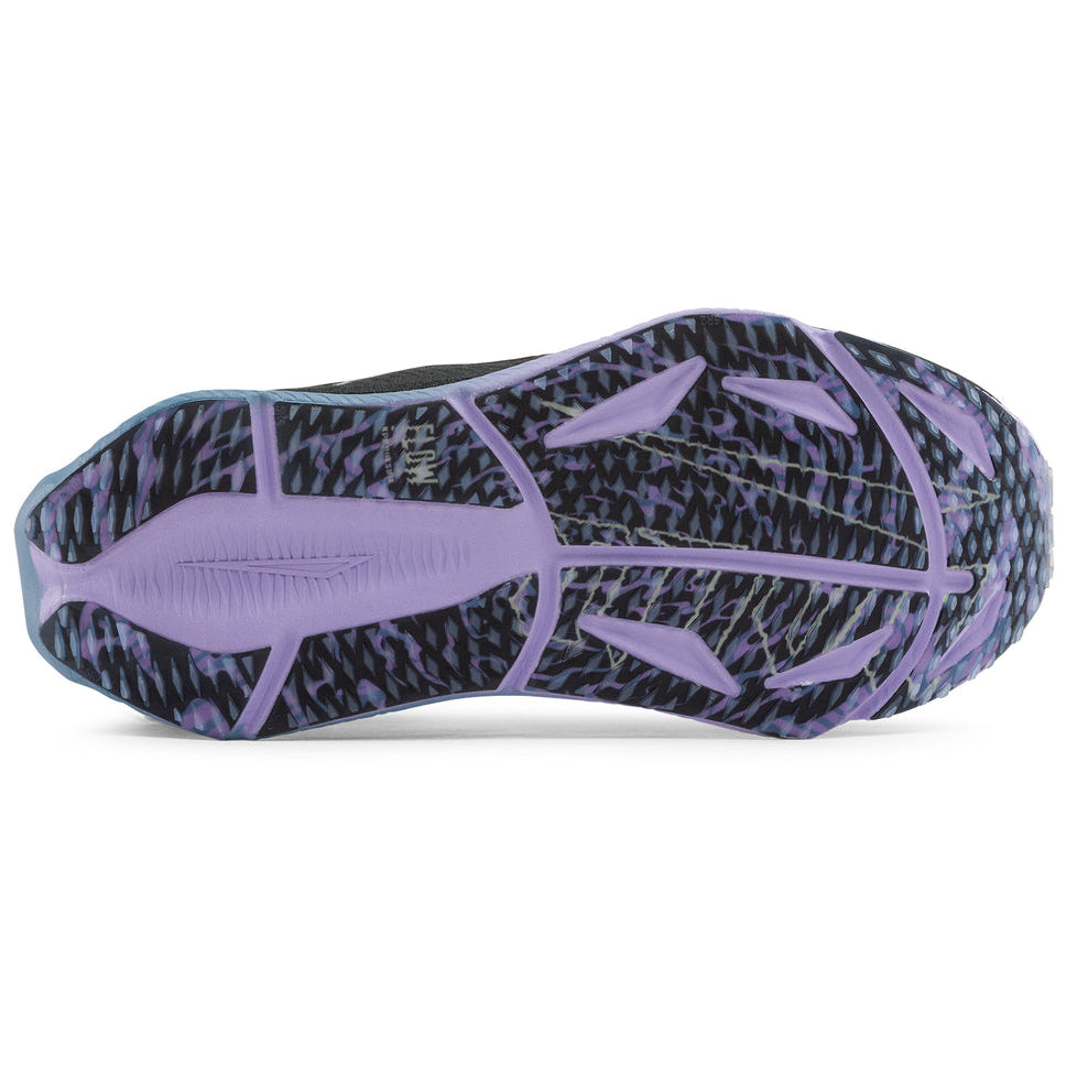The outsole of a running shoe shown from a top-down view, featuring a black and purple abstract pattern with a solid purple heel and toe.