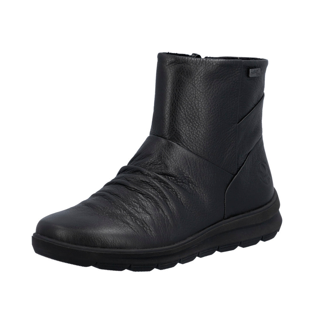 Black winter boot with fur lining on a white background