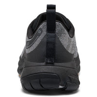 Black and gray athletic shoe on a white background