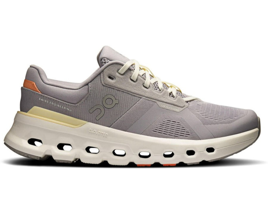 Gray running shoe with white sole on a white background